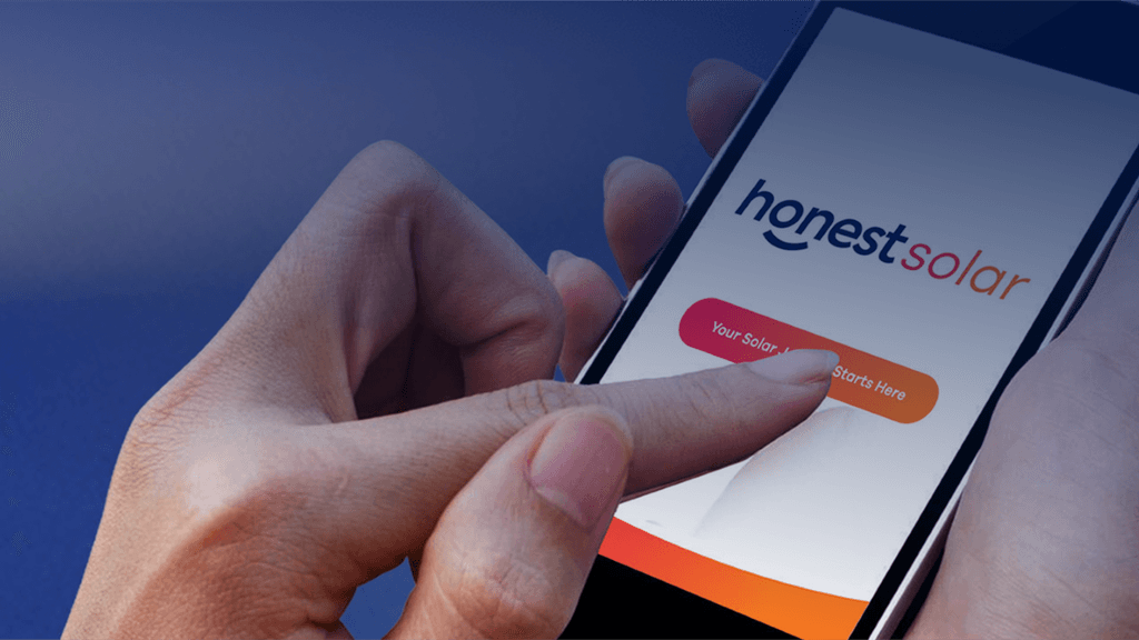 A hand holding a mobile device with a finger touching the button 'your solar journey starts here'